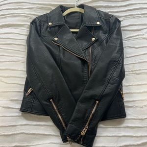 Great condition Blank NYC black faux leather jacket with gold hardware
